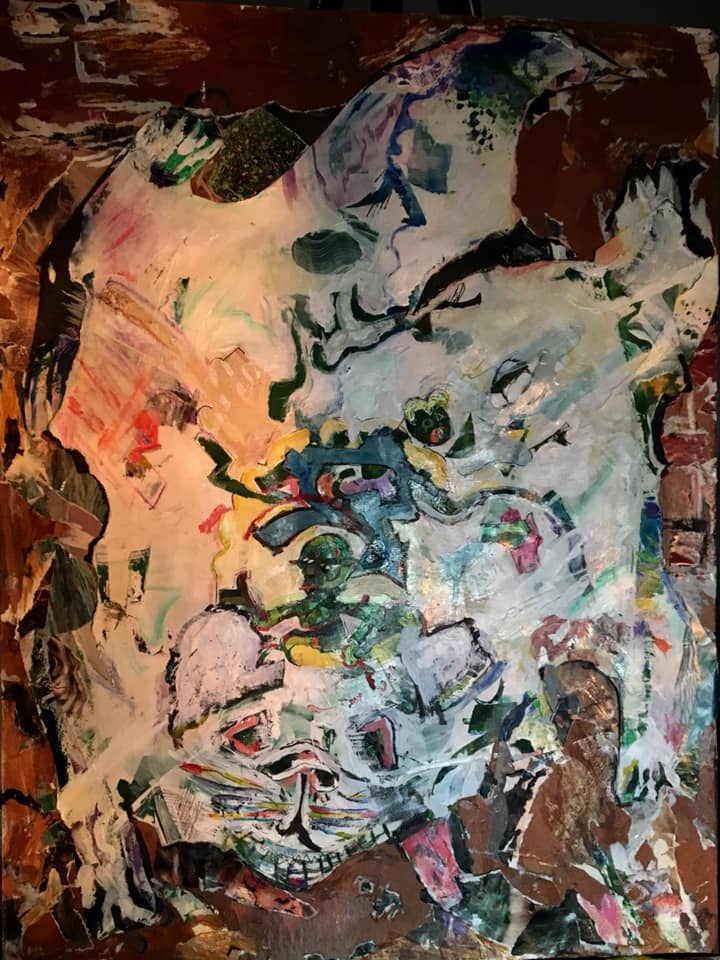 Abstract layered portrait built from torn paper and painted marks